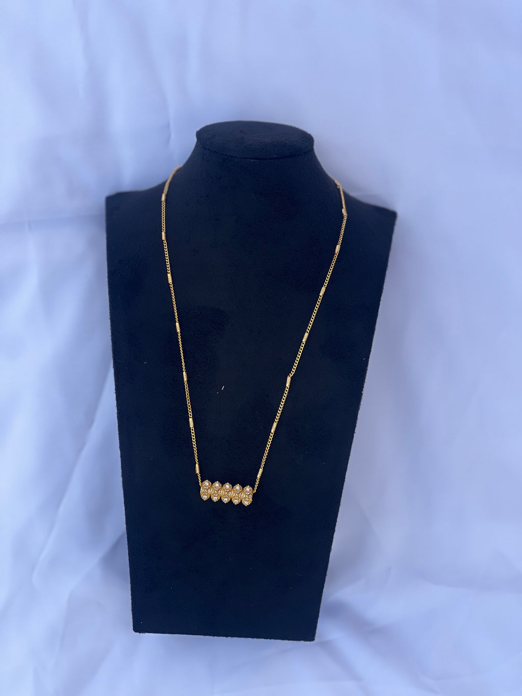 Gold Plated Mini Tilhari Necklace on black bust display