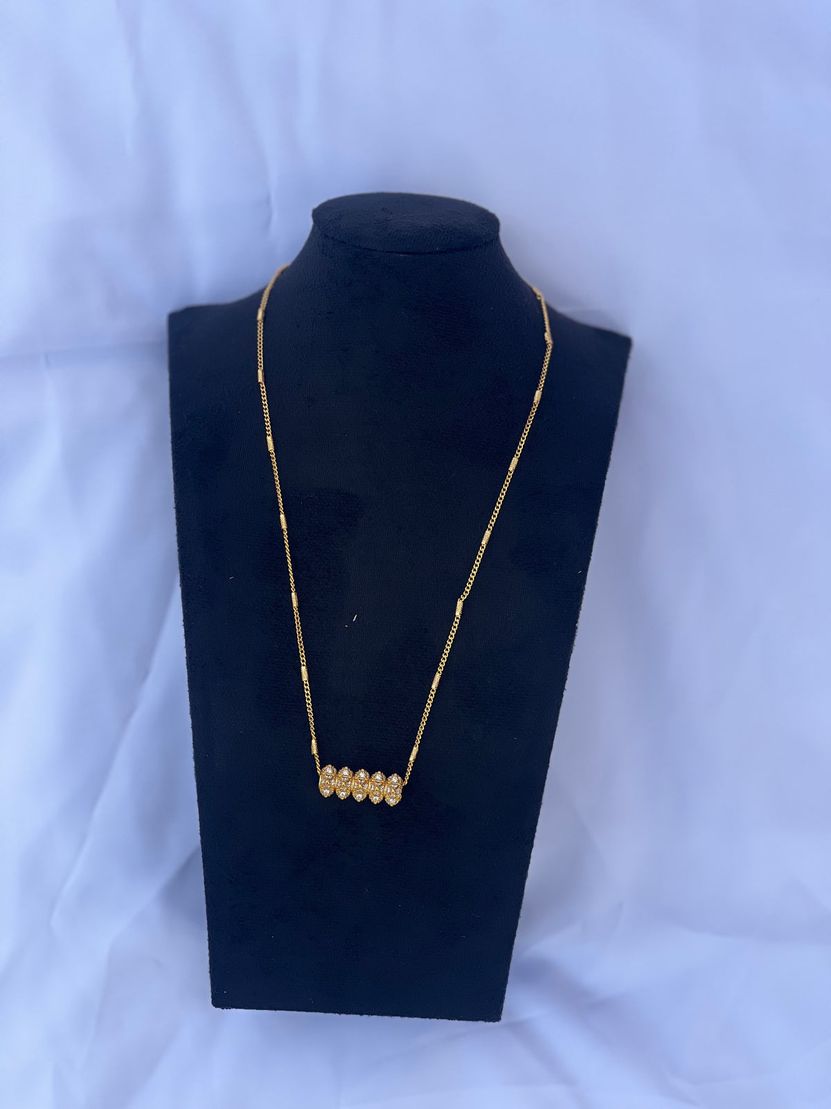 Gold Plated Mini Tilhari Necklace on black bust display