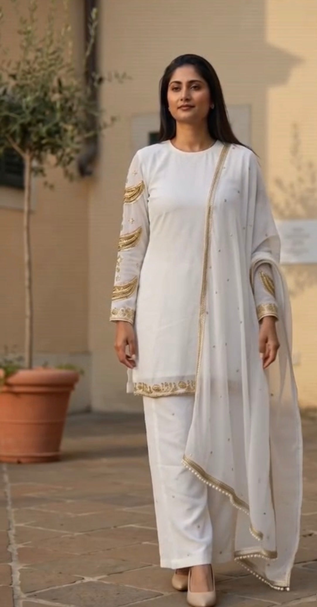 Pearl white kurta set full length model photo